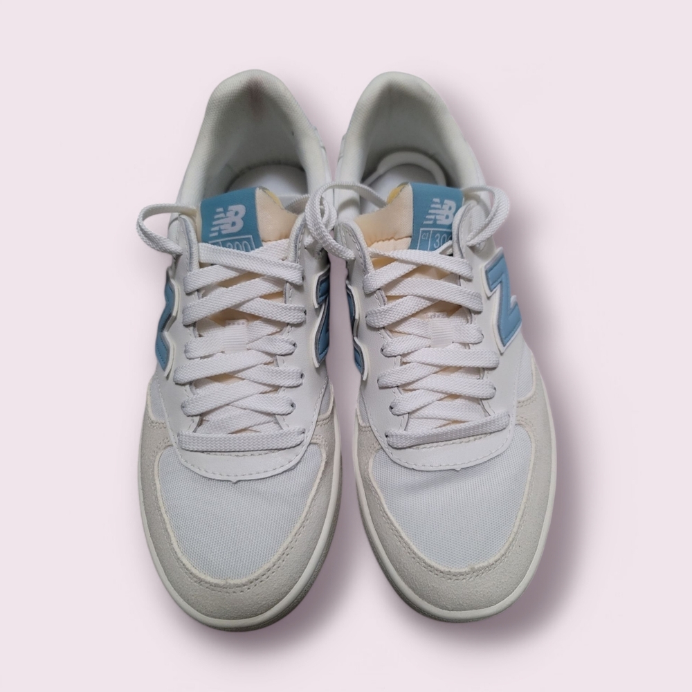 New Balance White and Blue Sneakers